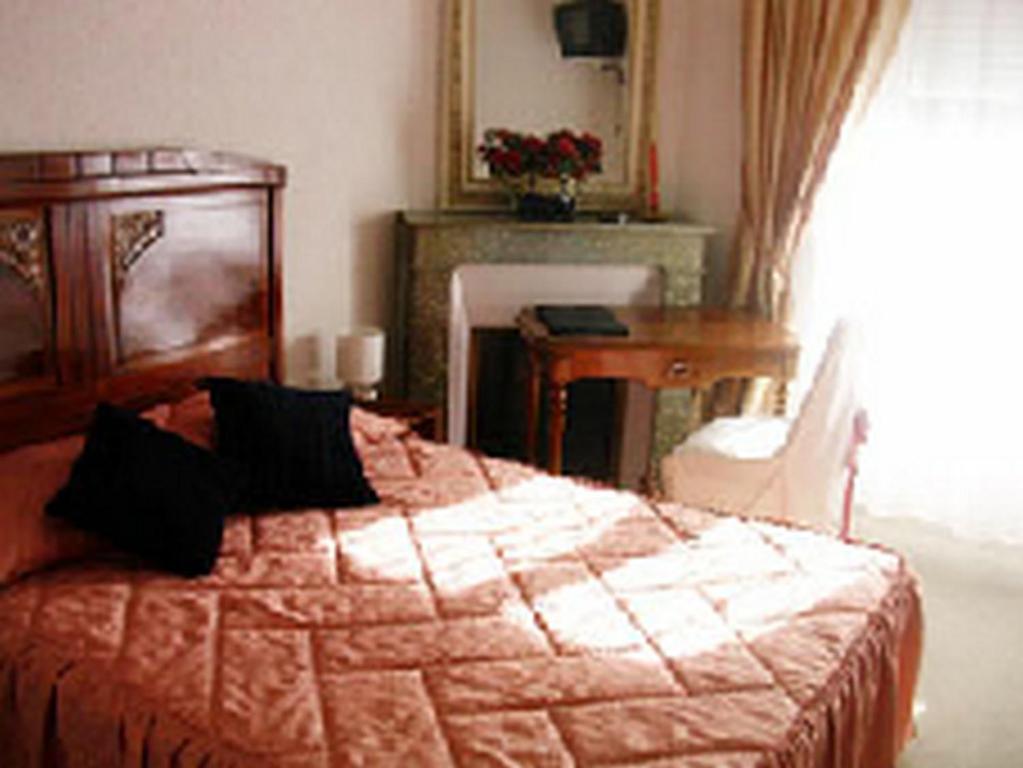 Arcantis Hotel Metropole Châtel-Guyon Rom bilde